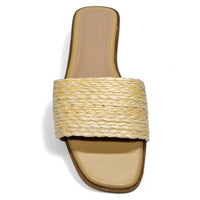 Woven straw slide sandal with flat sole and open toe, perfect Raffia Slide style