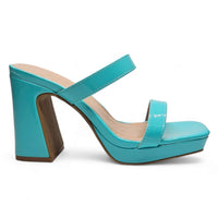 Turquoise square toe platform heels featuring two straps and a chunky heel