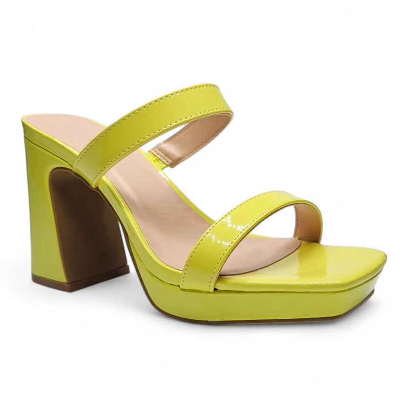 Bright yellow square toe platform heels with two straps and a chunky heel