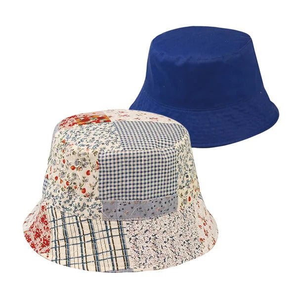 Two bucket hats, one solid blue and one floral patchwork, showcasing reversible design