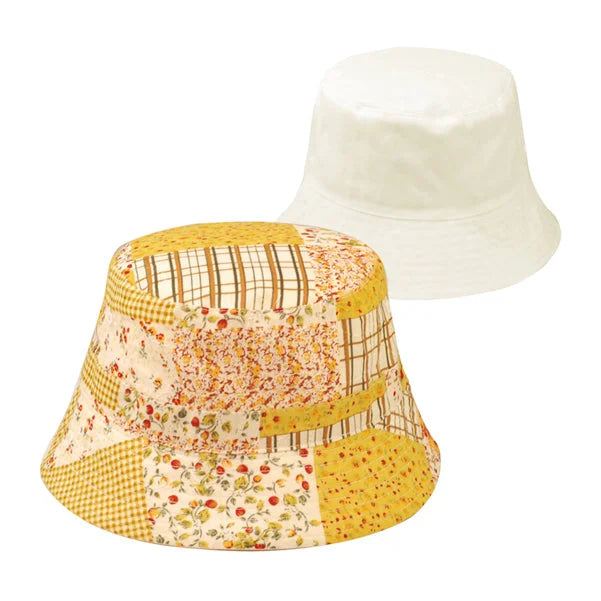 Two bucket hats, one white and one yellow floral, in Reversible Floral Patchwork style