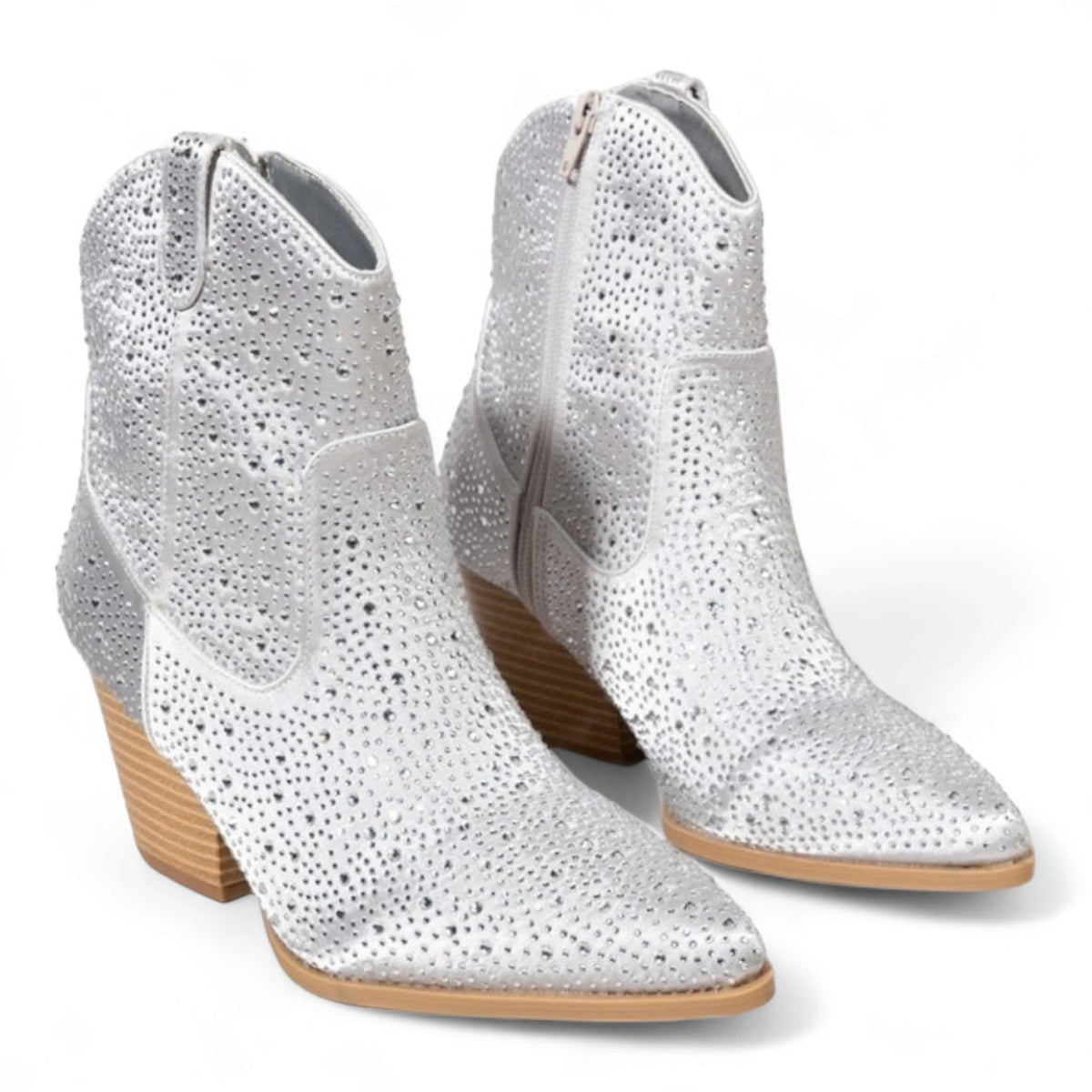 Pair of silver sparkly cowboy boots with wooden heels from Rhinestone Cowgirl