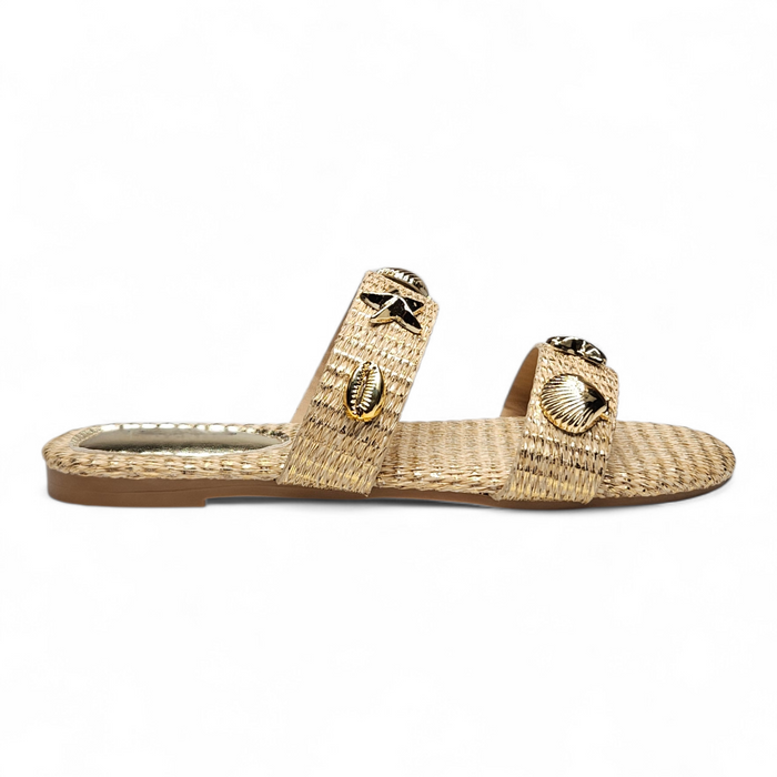 Woven sandal with shell and starfish embellishments on a white background