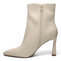 Pointed toe stiletto ankle boot in ivory with side zip and slim high heel
