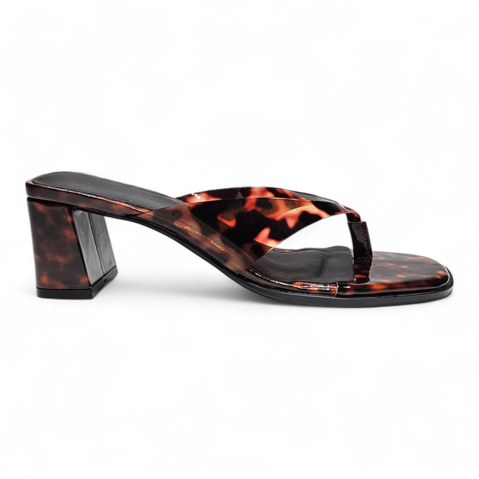 Tortoiseshell sandal with a block heel on a white background