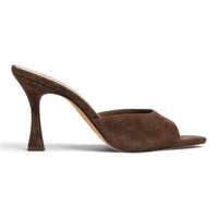 Brown suede heeled mule with open back, almond toe, and tall block heel.