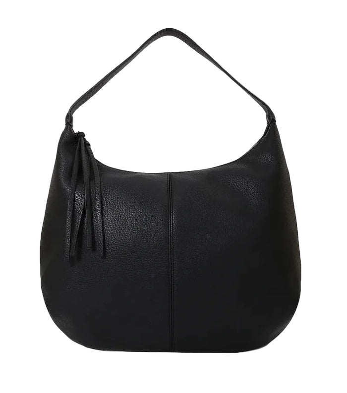 Black leather handbag with a strap on a light gray background