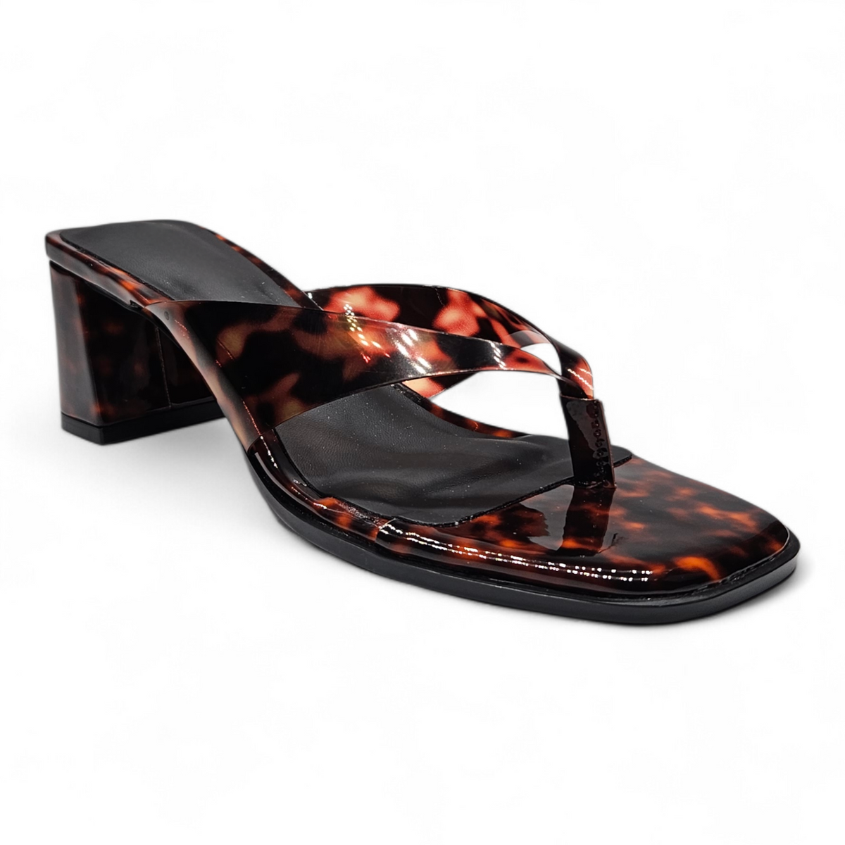 Tortoiseshell high-heeled sandal on a white background