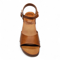 Brown sandal with a strap on a white background