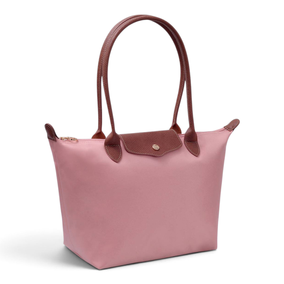 Light pink luxe tote bag with brown leather handles and front patch pocket