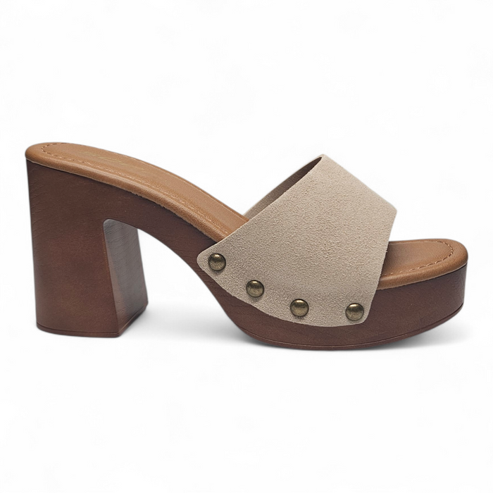 Beige sandal with wooden heel on a white background