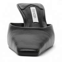 Black leather mule shoe with 'Steve Madden' branding on a white background