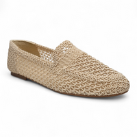 Beige woven flat shoe on a white background