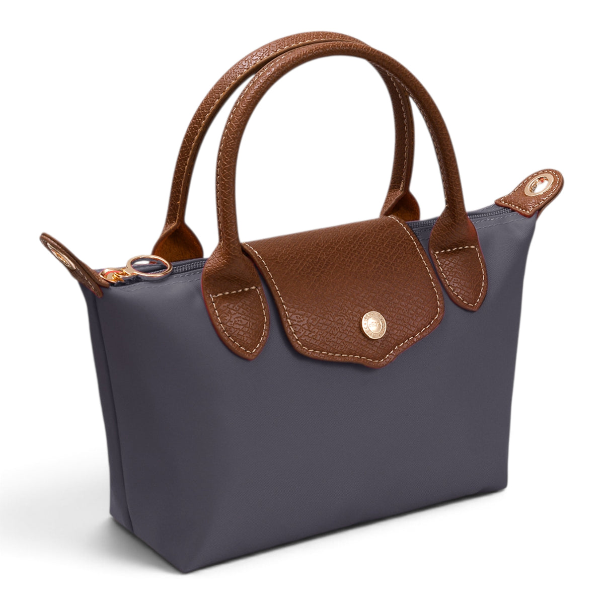 Medium luxe top handle crossbody bag in dark navy with brown handles and zip top hardware