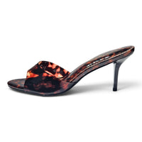 Pair of tortoise-pattern open-toe mule heels with cross band and slim high stiletto heels