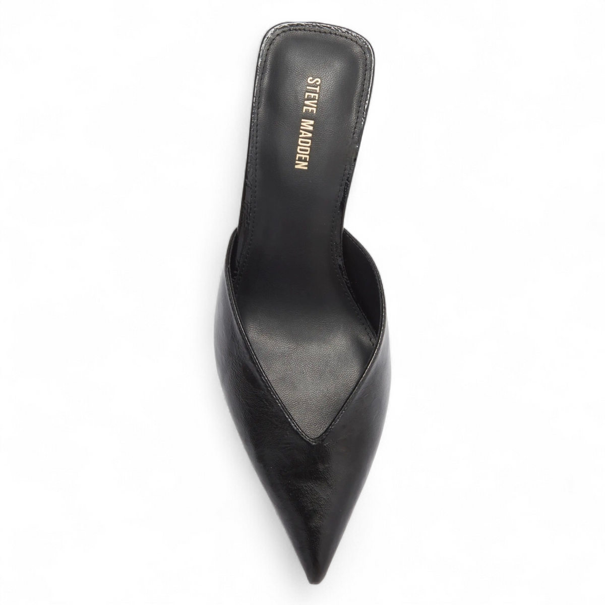 Black pointed-toe shoe with 'Steve Madden' branding on a white background