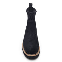 Black suede ankle bootie with knit-lined collar and tan-trimmed rubber sole