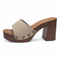 Beige sandal with wooden block heel on a white background