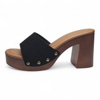 Black sandal with brown wooden sole on a white background