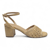 Beige sandal with woven design on a white background