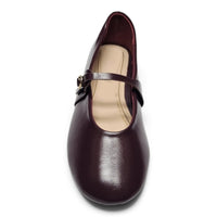 Plum Mary Jane flats with buckle strap across the instep and rounded toe