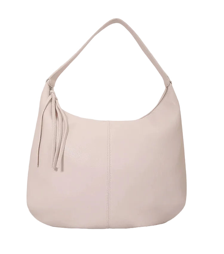 Beige handbag on a light gray background