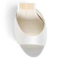 White satin heeled mule with open back and cushioned insole lining.