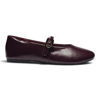 Plum Mary Jane flats with top strap, round toe, and small buckle hardware