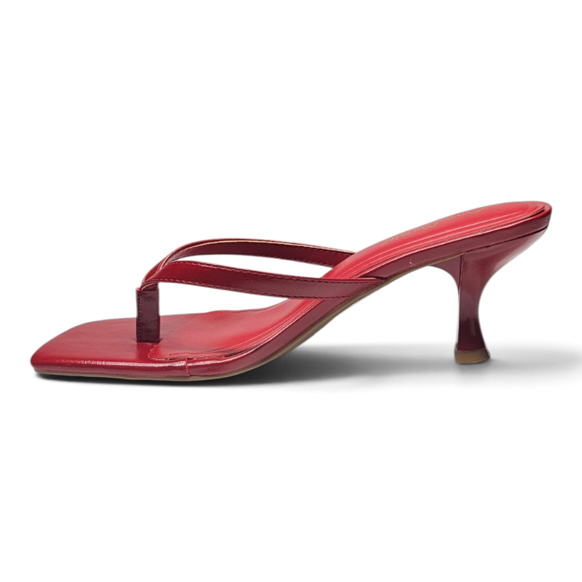 Red thong kitten heel sandals with thin crossover strap and low kitten heel