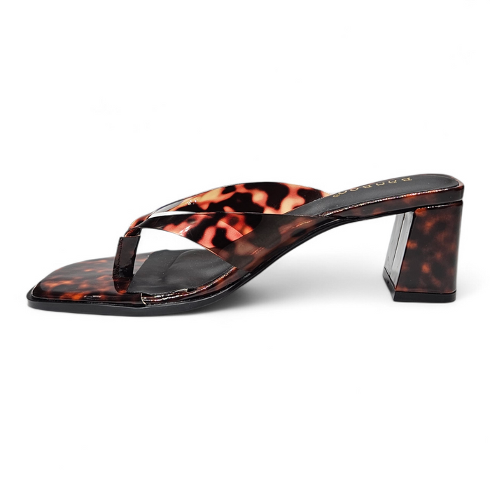 Tortoiseshell high-heeled sandal on a white background