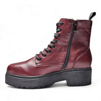 Burgundy leather combat boots with chunky sole and side zipper for stylish footwear