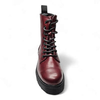 Burgundy leather combat boots with thick black sole and laces for stylish comfort