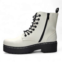 White leather combat boots with black laces and chunky platform sole for stylish footwear