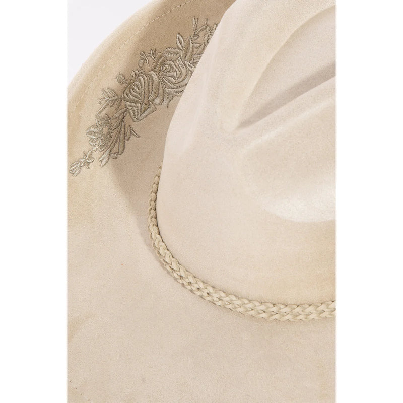 Delicate white fabric with rose embroidered braided band on a stylish fedora cowboy hat