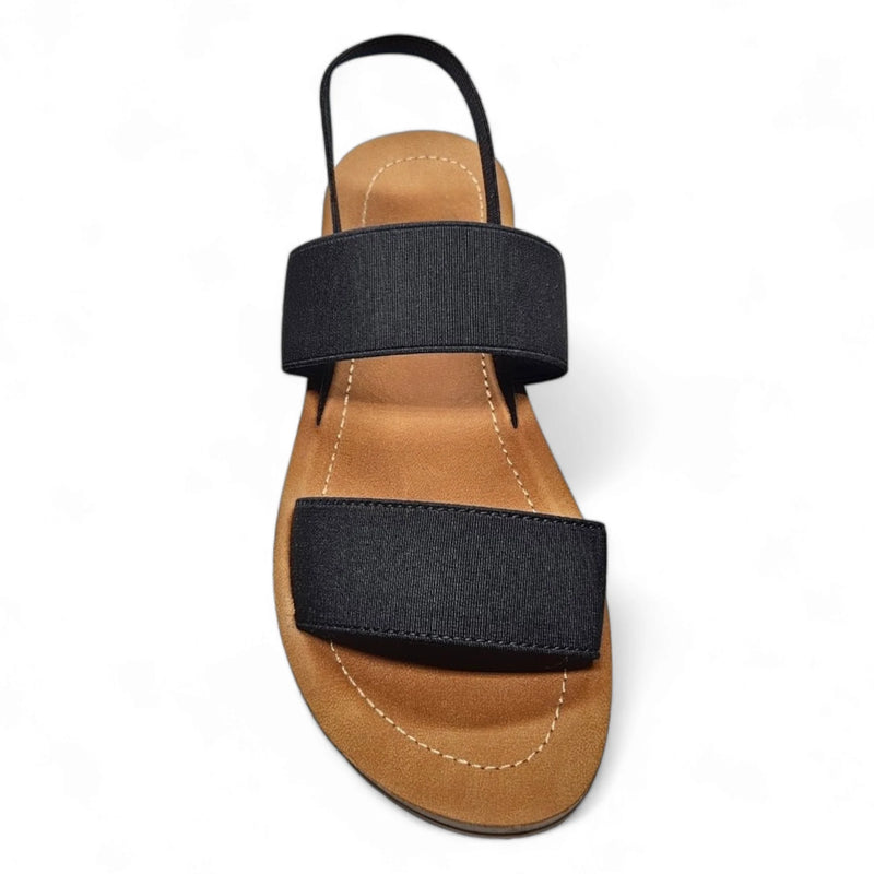 Flat sandal with two black elastic straps and a tan sole, perfect for women’s casual wear