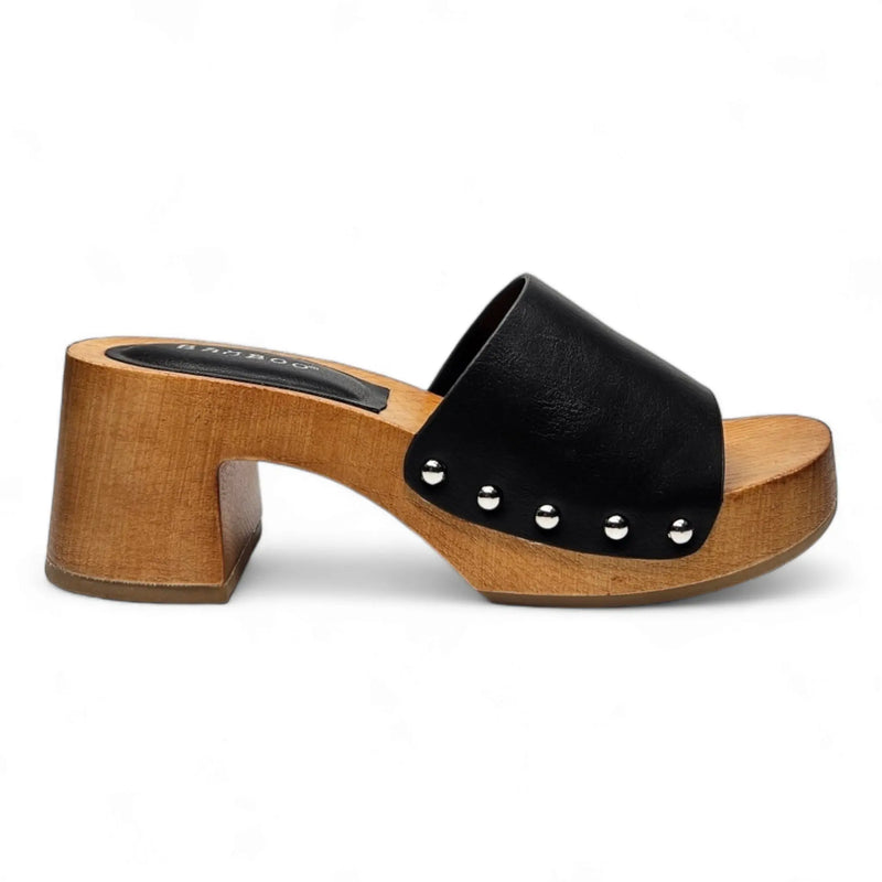 Black leather slide sandal with wooden platform heel and silver studs for open toe clogs