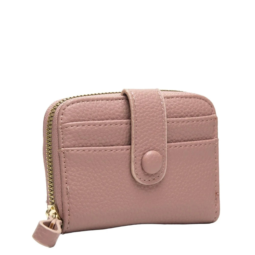 Pink leather small zip wallet featuring a zipper closure and card slots