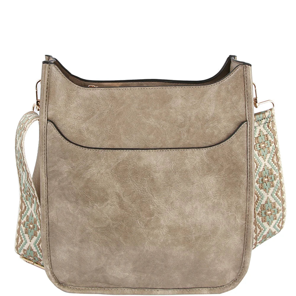 Beige leather crossbody bag featuring a stylish guitar strap for versatile use