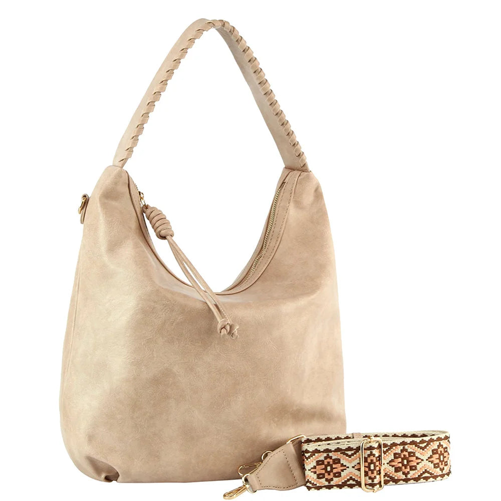 Beige leather smooth hobo bag with decorative guitar strap for stylish accessorizing