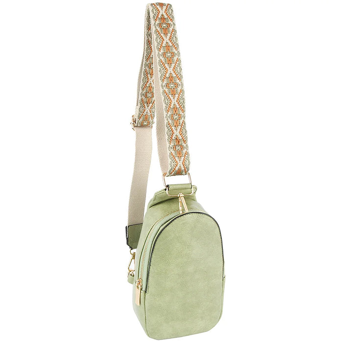 Mint green smooth zipper sling crossbody bag with patterned guitar strap