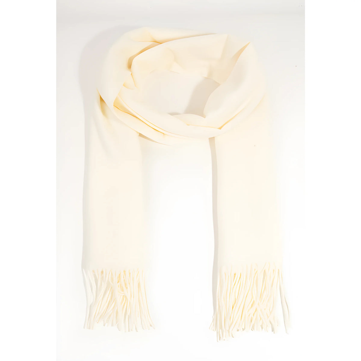Cream-colored solid color oblong scarf with stylish fringed ends