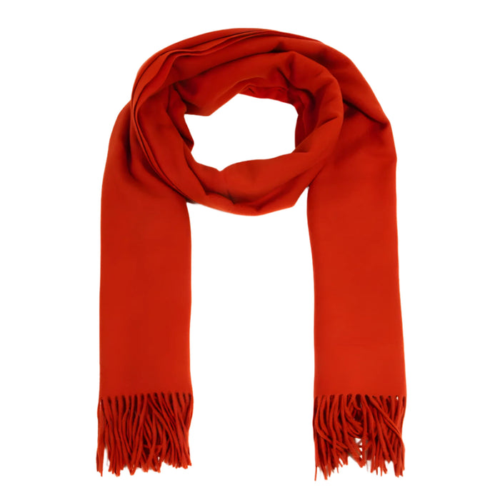 Bright red solid color oblong scarf with fringed ends for stylish winter wear