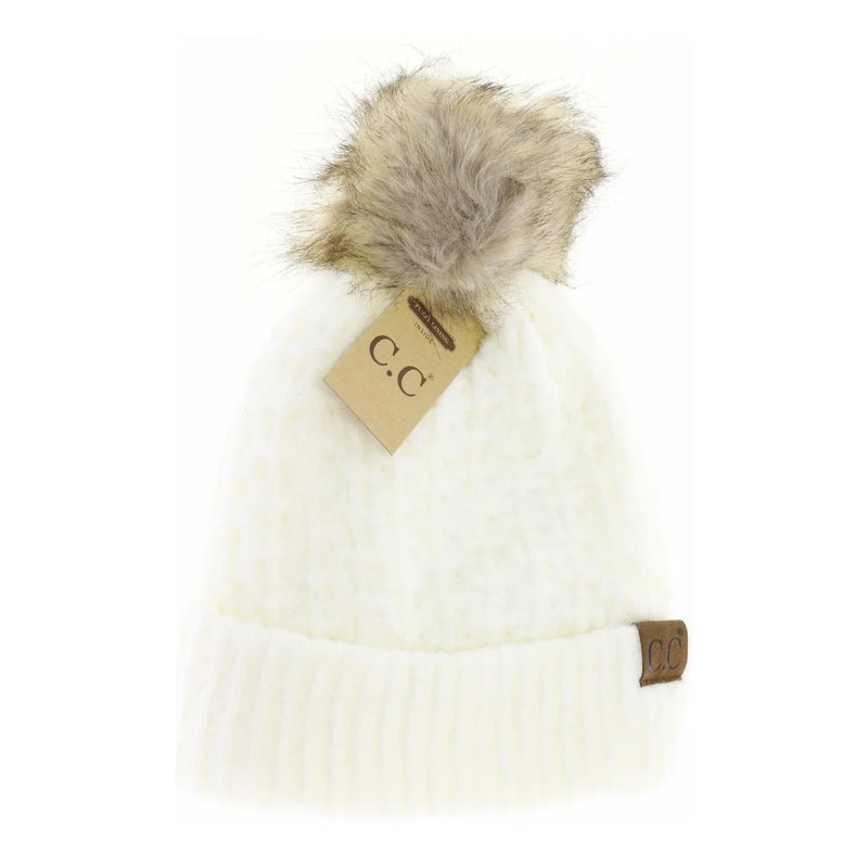 Solid Smocked Stitch Fur Pom C.C Beanie with faux fur pom-pom and tag attached