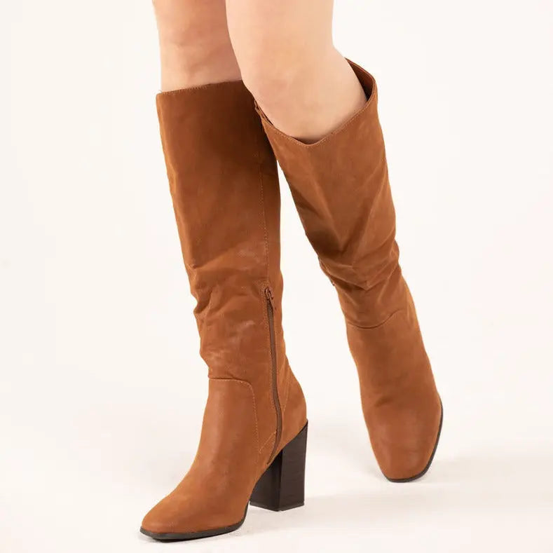 Knee-high tan leather Soundscape Boots with stylish chunky heels