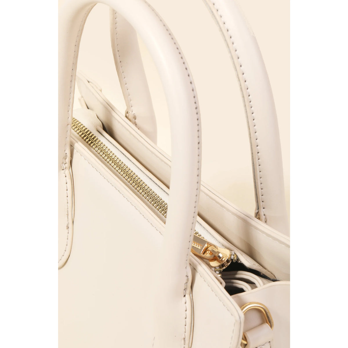 White leather Square Braid Box Handbag featuring a zipper and stylish handle