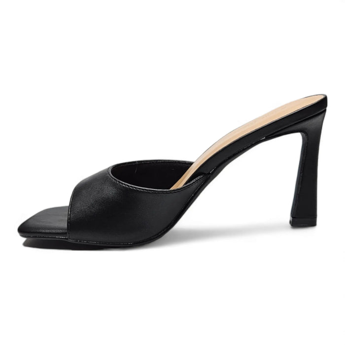 Black leather steam heeled mule with square toe and angled heel for stylish comfort