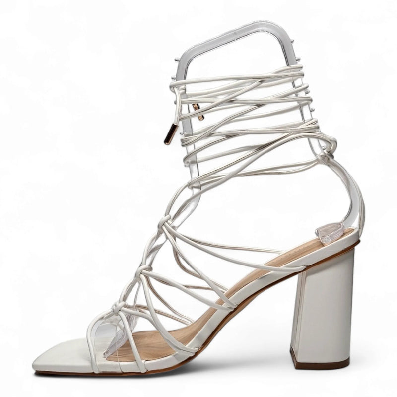 White strappy lace up heel sandal with chunky heel and ankle-wrap design