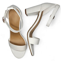 Classic chunky white high-heeled sandals with ankle straps for stylish footwear