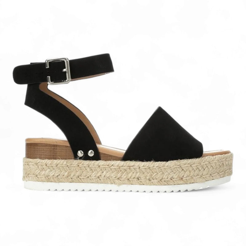 Black suede platform sandal with espadrille sole, perfect for summer style