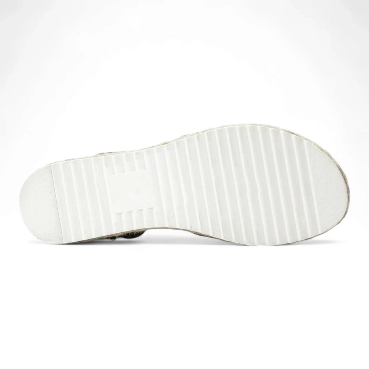 White rubber sole of Summer Platform Wedges with textured tread pattern